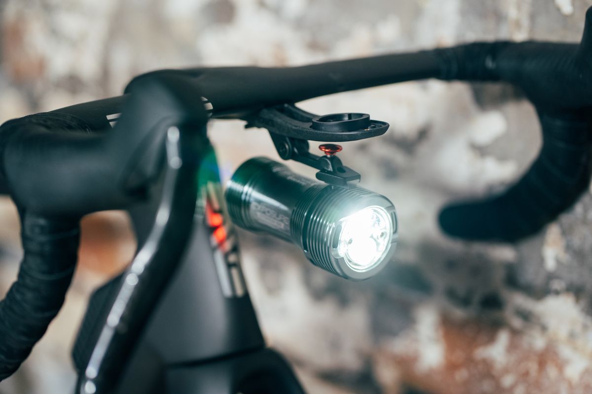 The Exposure Strada 13 SB attached to the bars of a road bike