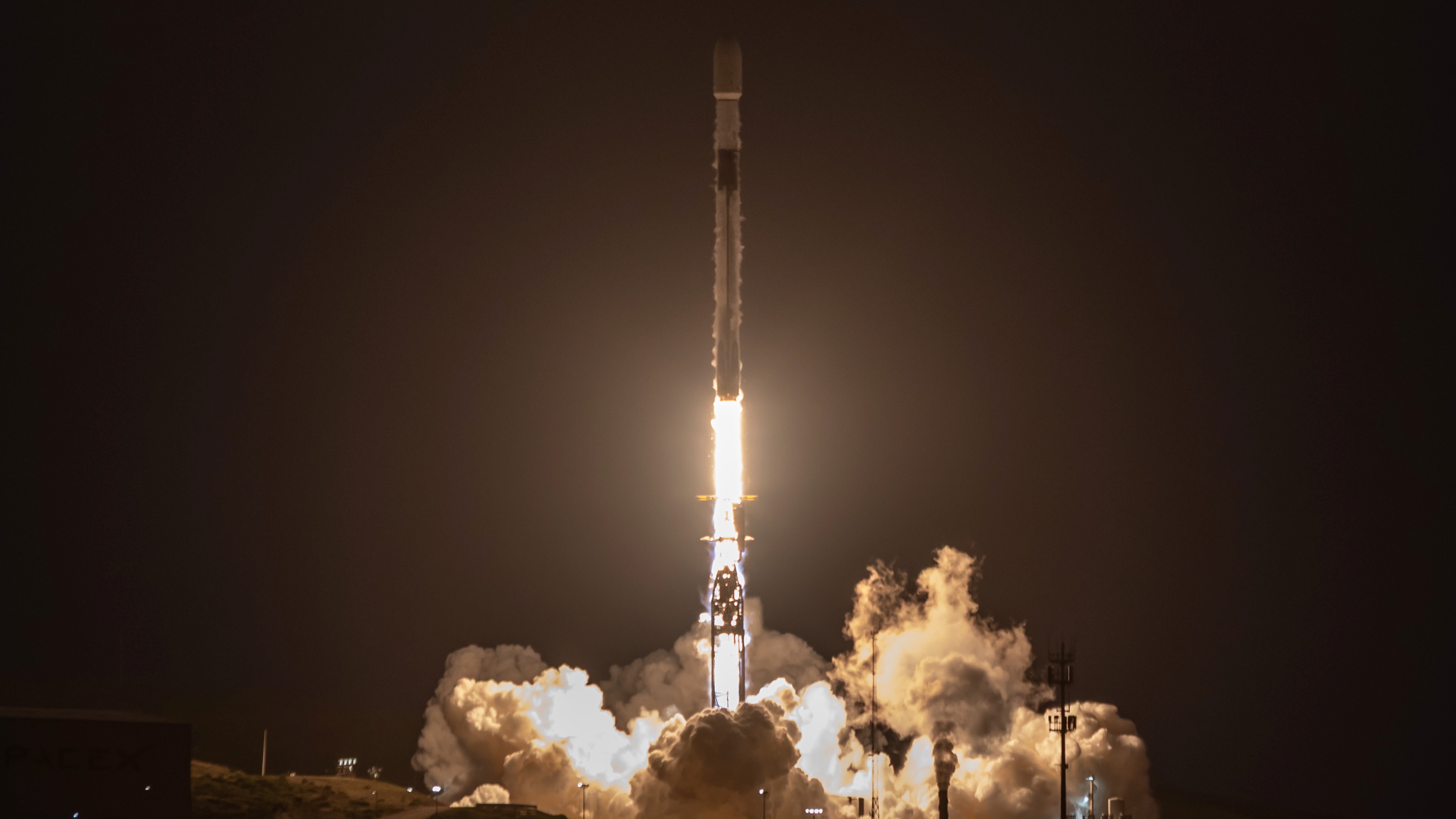 A SpaceX Falcon 9 rocket launches 24 Starlink satellites to orbit from California's Vandenberg Space Force Base on June 24, 2026.