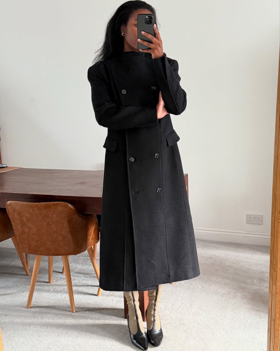 Marilyn NK wearing a wool coat.