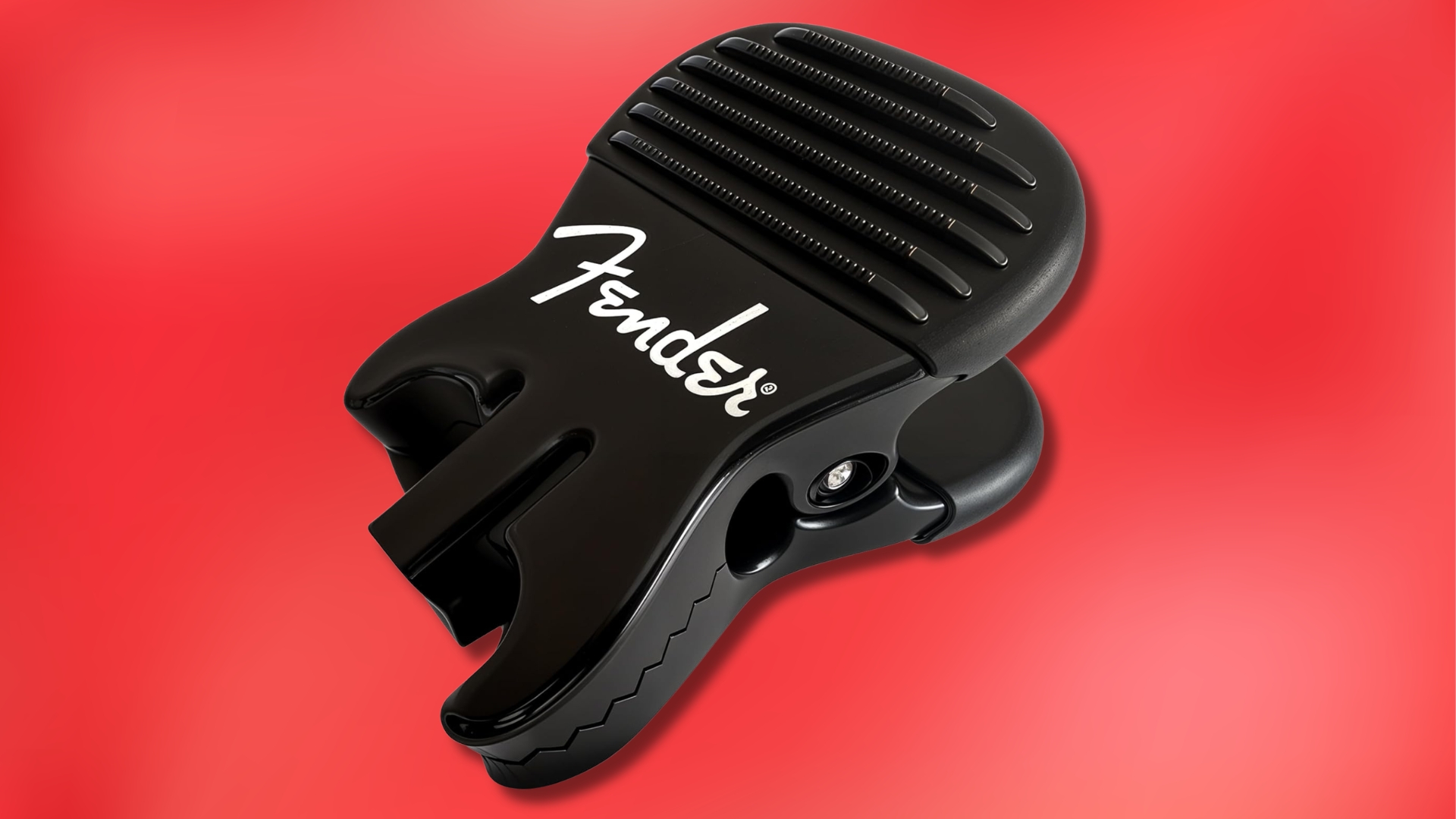 A Fender callus builder on a red background