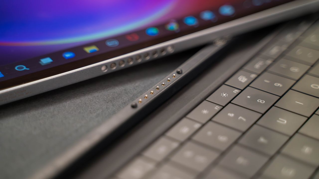 Dell XPS 13 2-in-1 (2022) on a hotel room desk