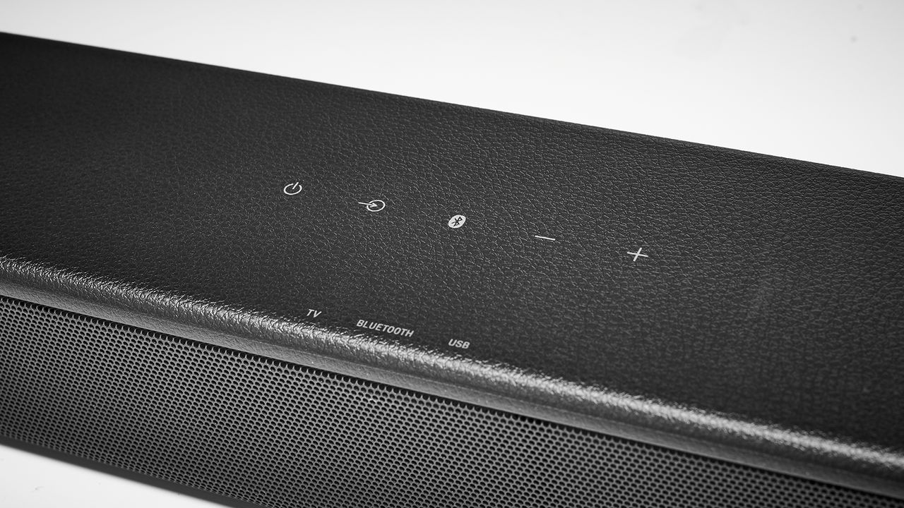 A close-up of the controls on the top of Sony HT-SF150 soundbar