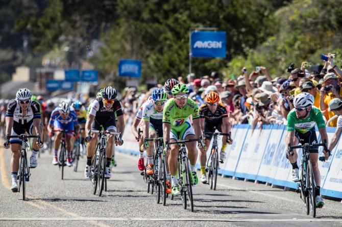 Mark Cavendish (Omega Pharma-Quickstep) beats Peter Sagan (Cannondale) to the line in the bunch sprint