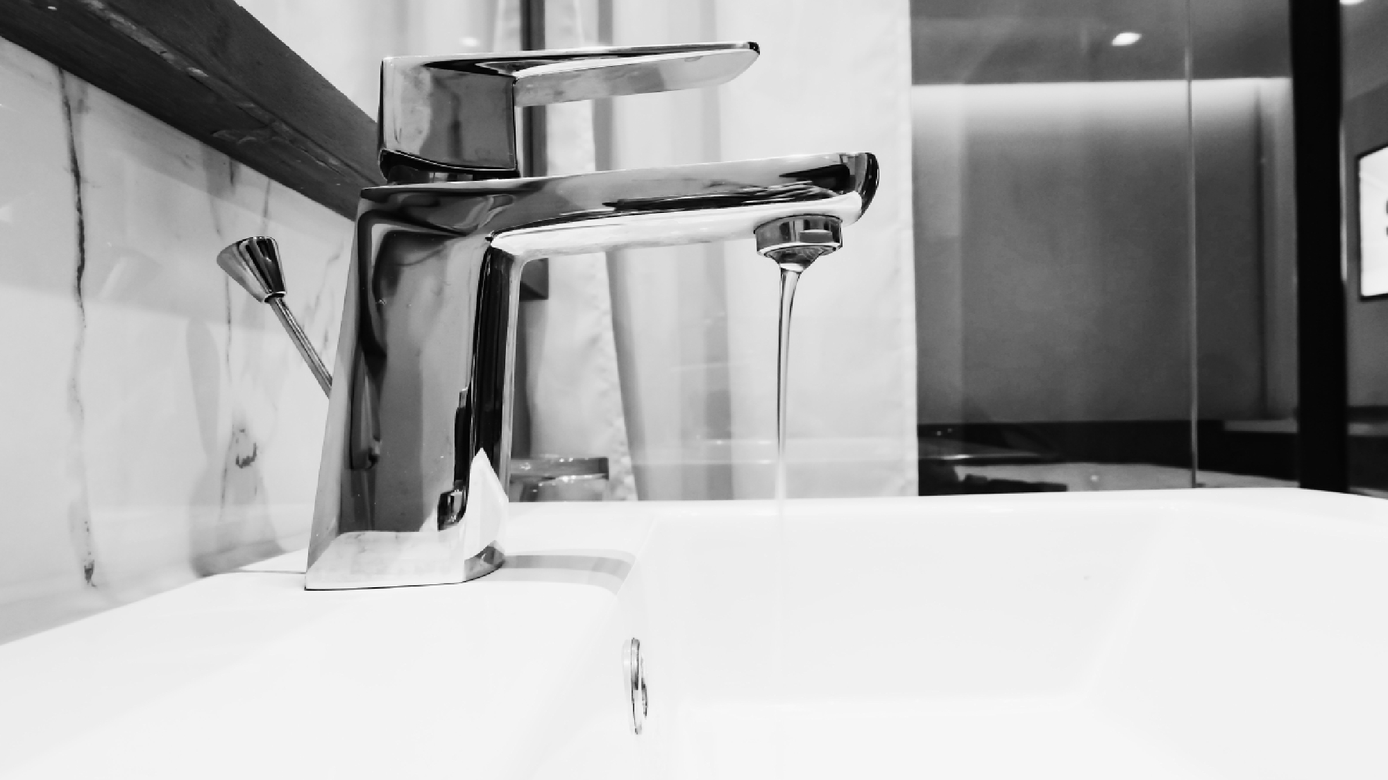 Dripping faucet in bathroom 