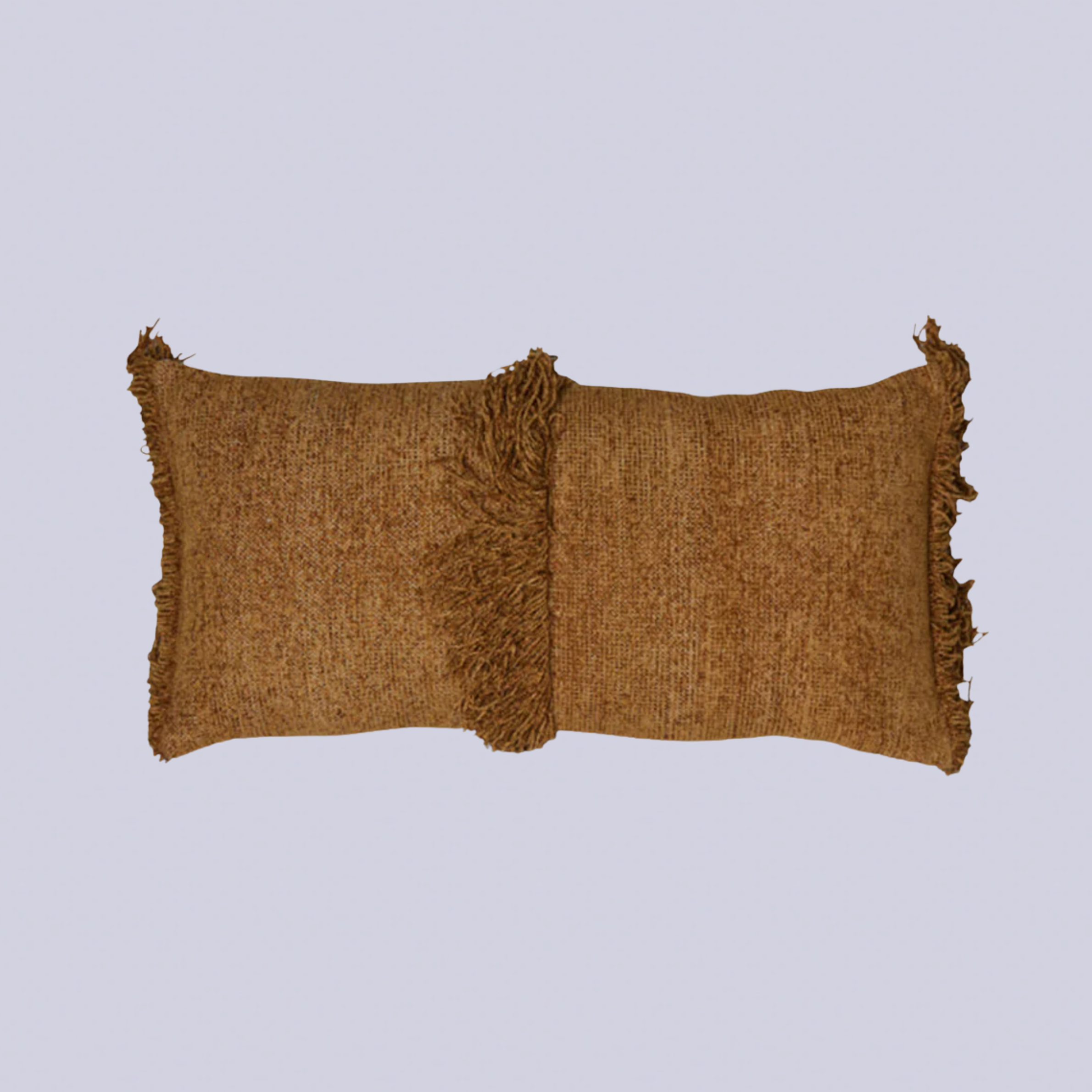 An ochre fringed pillow 