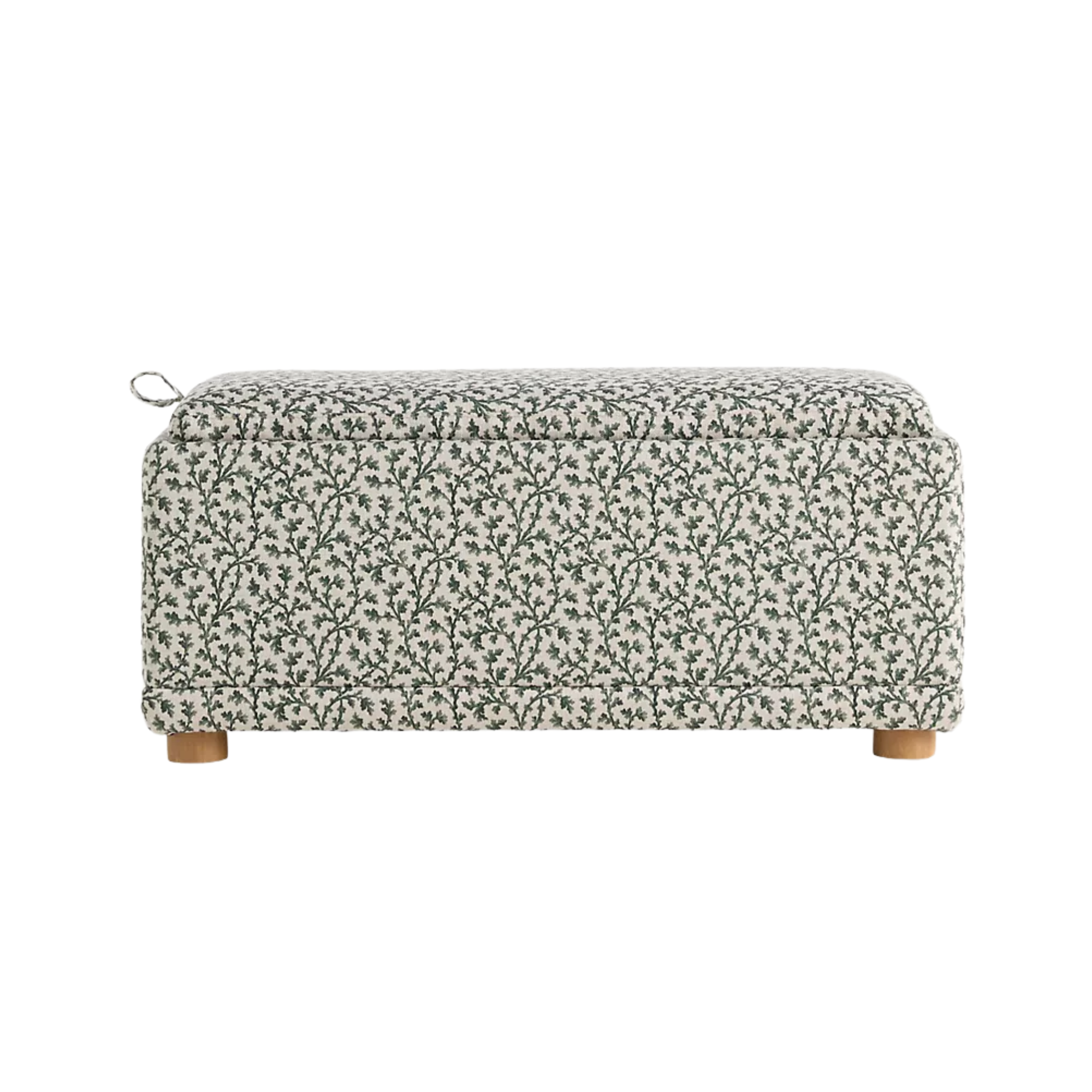 a storage ottoman with decorative vine upholstery