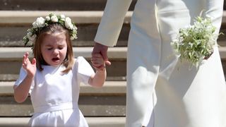 Princess Charlotte sneezes after the wedding of Prince Harry and Ms. Meghan Markle at St George's Chapel at Windsor Castle on May 19, 2018 in Windsor, England.