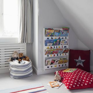 attic kids room with book corner and toys