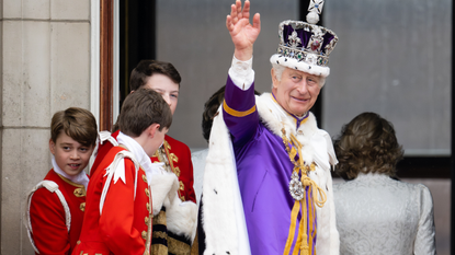 King Charles III and Prince George of Wales (L) on the balcony of Buckingham Palace, London, following the coronation on May 06, 2023 in London, England. The Coronation of Charles III and his wife, Camilla, as King and Queen of the United Kingdom of Great Britain and Northern Ireland, and the other Commonwealth realms takes place at Westminster Abbey today. Charles acceded to the throne on 8 September 2022, upon the death of his mother, Elizabeth II.