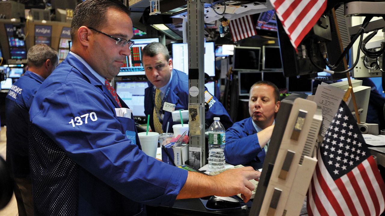 Traders on the floor of the New York Stock Exchange