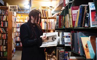 Chelsea Wolfe reads a book
