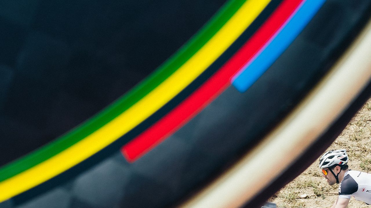 Rainbow flashes on the wheels of world champion Tom Dumoulin's TT bike