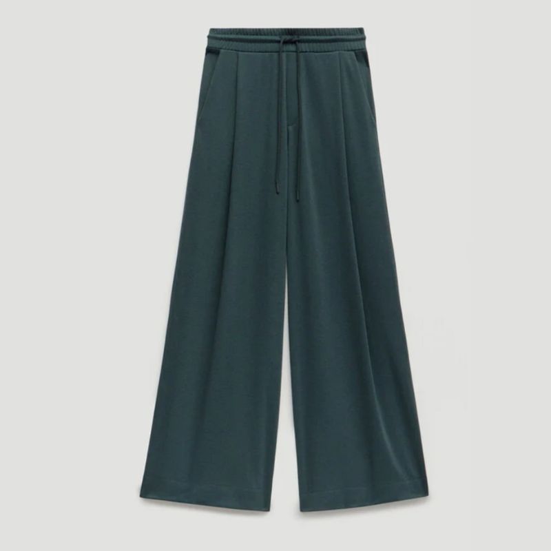 A cutout of wide leg green trousers by Hush
