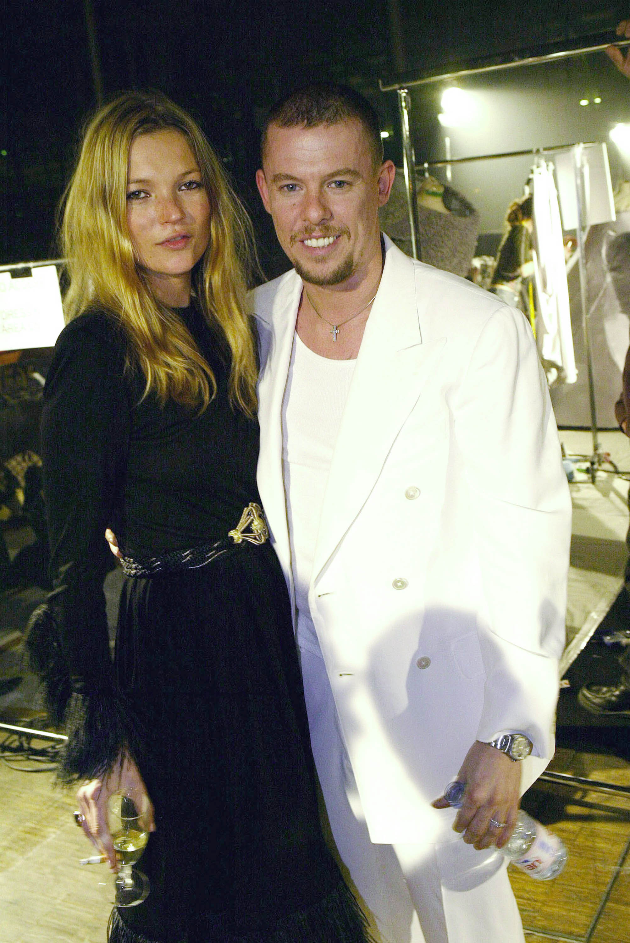 Designer Alexander McQueen poses with model Kate Moss at the Alexander McQueen ready-to-wear Fall-Winter collection 2004-2005 fashion show on March 5, 2004 in Paris, France.