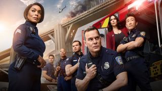 The cast of 9-1-1 assemble by a fire truck and a burning bridge