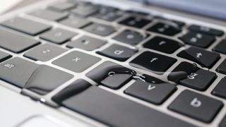 Water on Chromebook keyboard