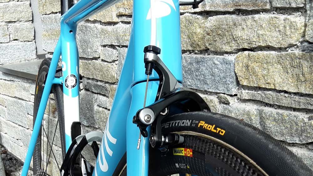 The bike is a sky blue colour with white graphics