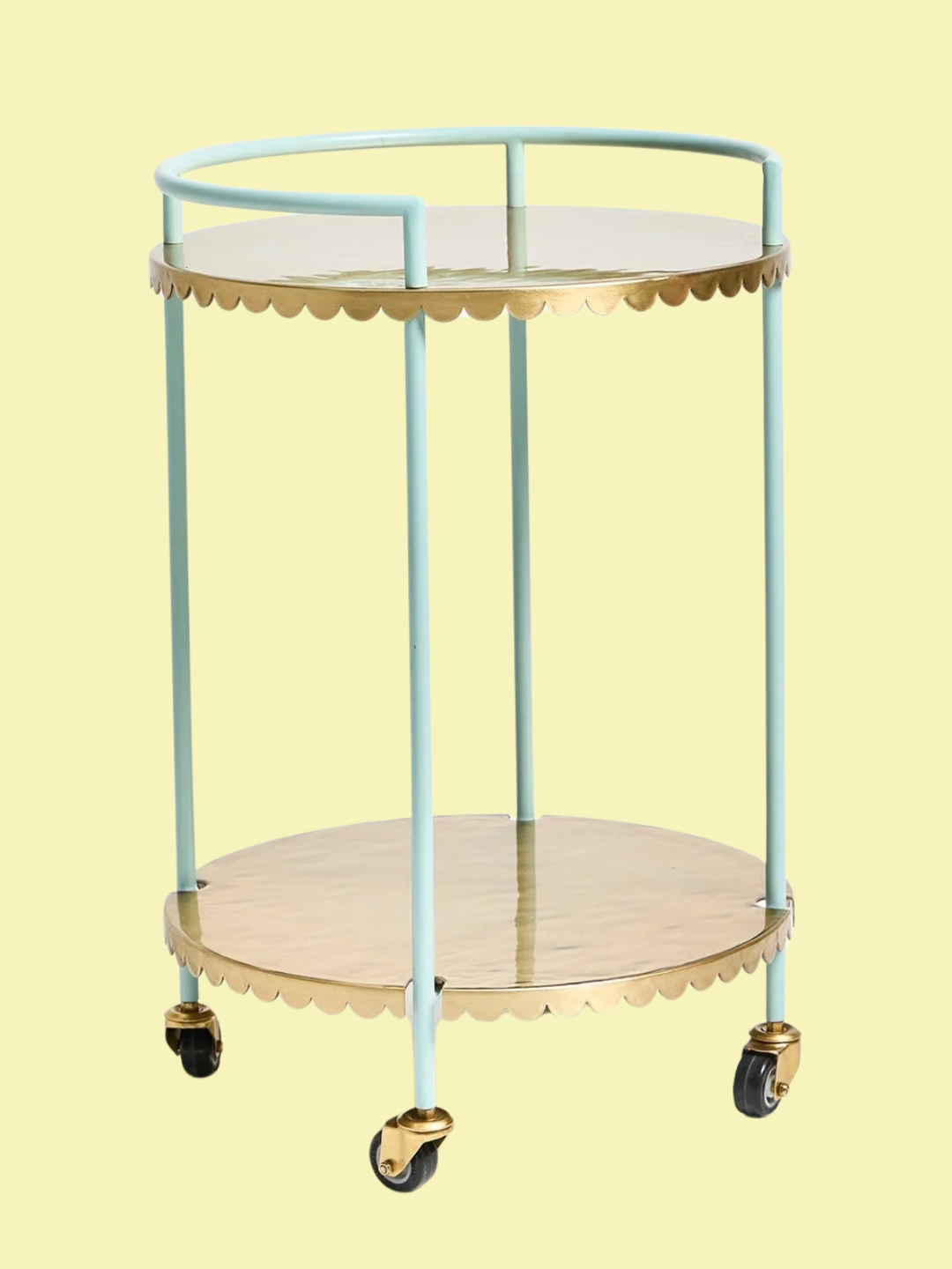 A gold and teal bar cart