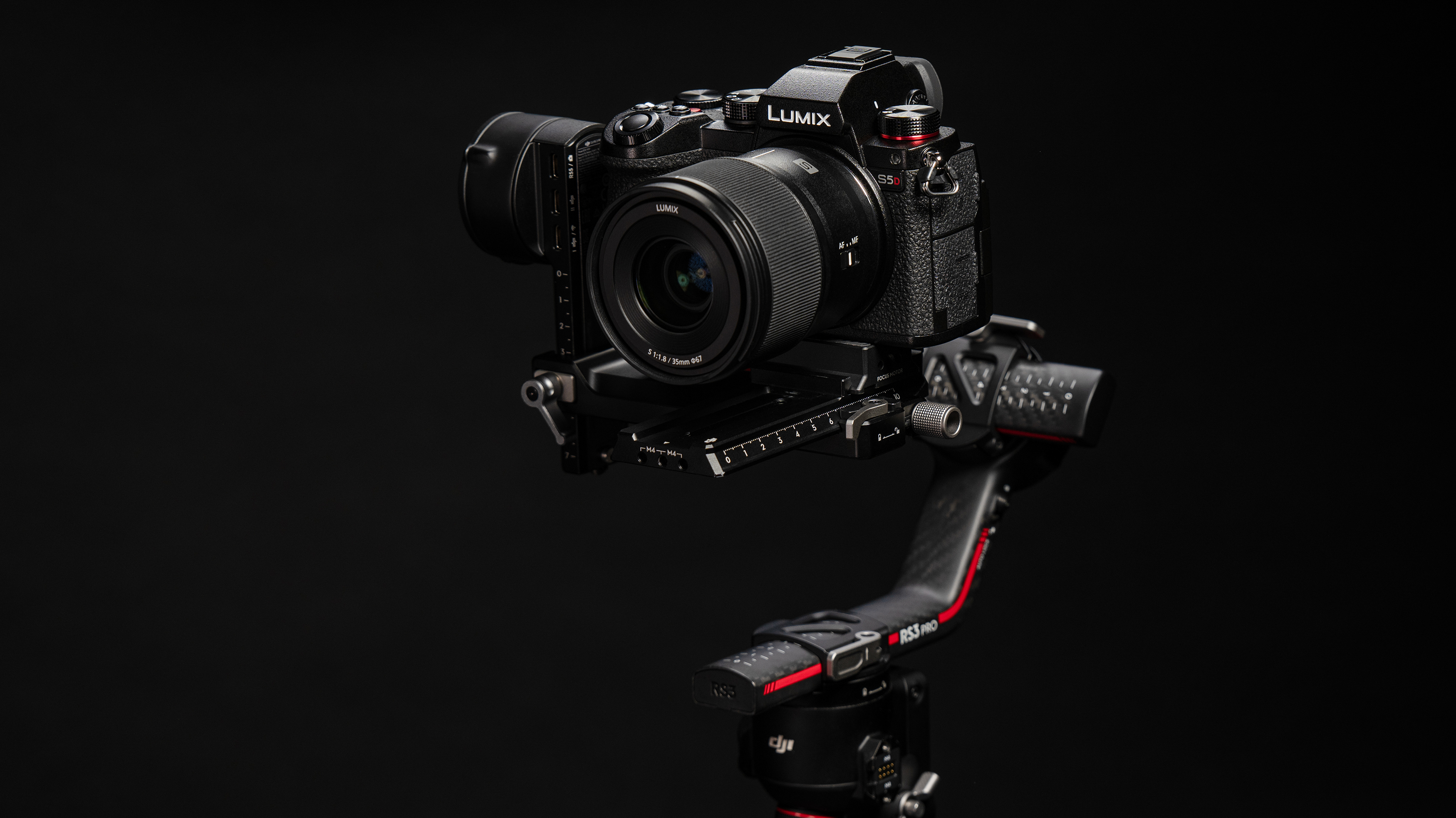 Panasonic Lumix S5D with the DJI RS 4 gimbal, black background