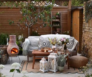 patio with chiminea and outdoor seating