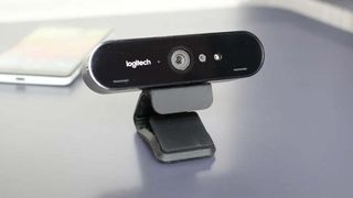 Logitech Brio 4k Webcam on desk.