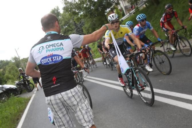 Petr Vakoc (Omega Pharma-QuickStep) reaches for a musette at the Tour of Poland.