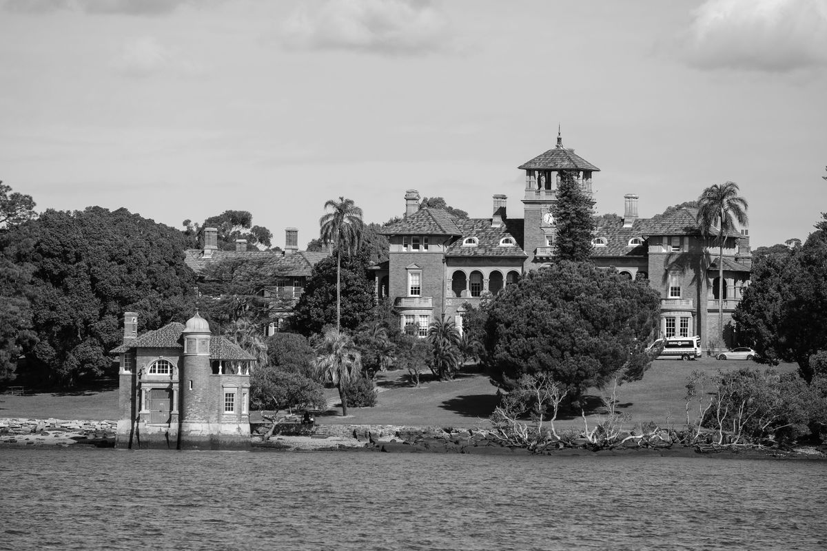 A large 19th century building in black and white