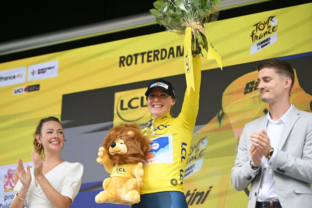 DORDRECHT NETHERLANDS AUGUST 13 Charlotte Kool of The Netherlands and Team dsmfirmenich PostNL celebrates at podium as Yellow leader jersey winner during the 3rd Tour de France Femmes 2024 Stage 2 a 679km stage from Dordrecht to Rotterdam UCIWWT on August 13 2024 in Dordrecht Netherlands Photo by Dario BelingheriGetty Images