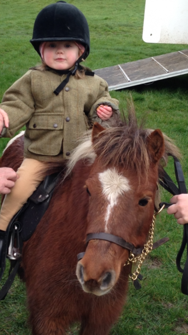 Holly White aged 2 on Smartie with Barlow by Kate White