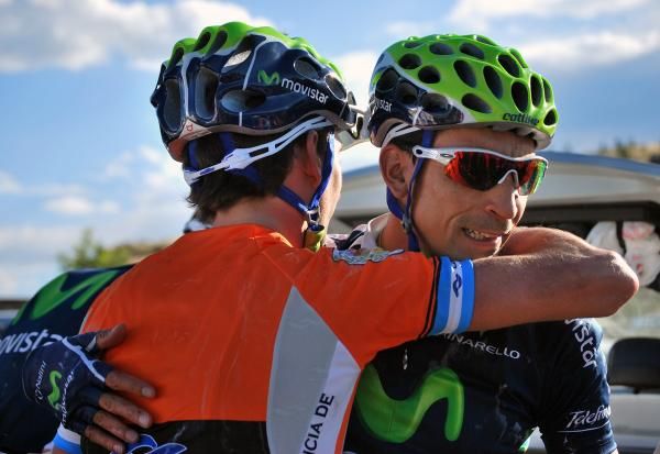 Tondo is consoled by teammate Mauricio Soler after crashing out of the race lead.