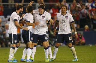 USA players celebrate a goal against Jamaica in October 2013.