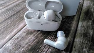Amazfit Powerbuds Pro running headphones with charging case