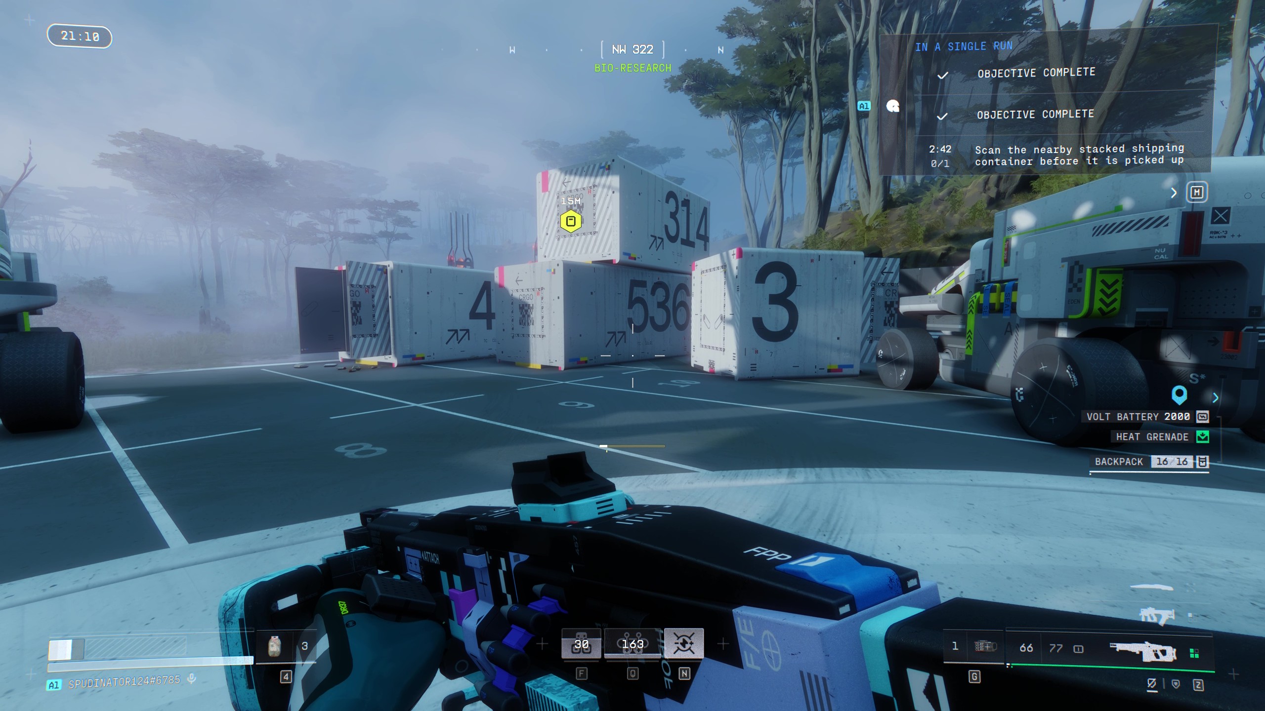 Marathon Introducing Traxus: A player looking at a stack of shipping containers on a landing pad.