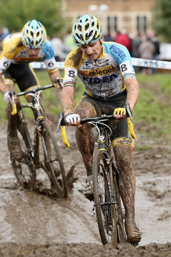 Bart Wellens (Telenet Fidea) rides to second place in a muck filled course in Laarne