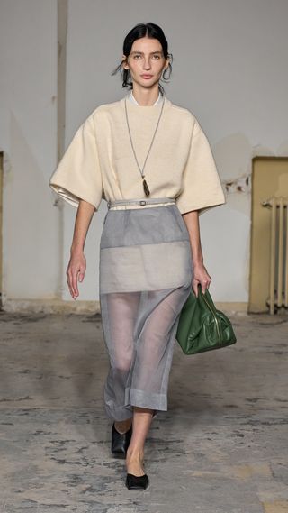 A Carven model walks the spring/summer 2024 runway.