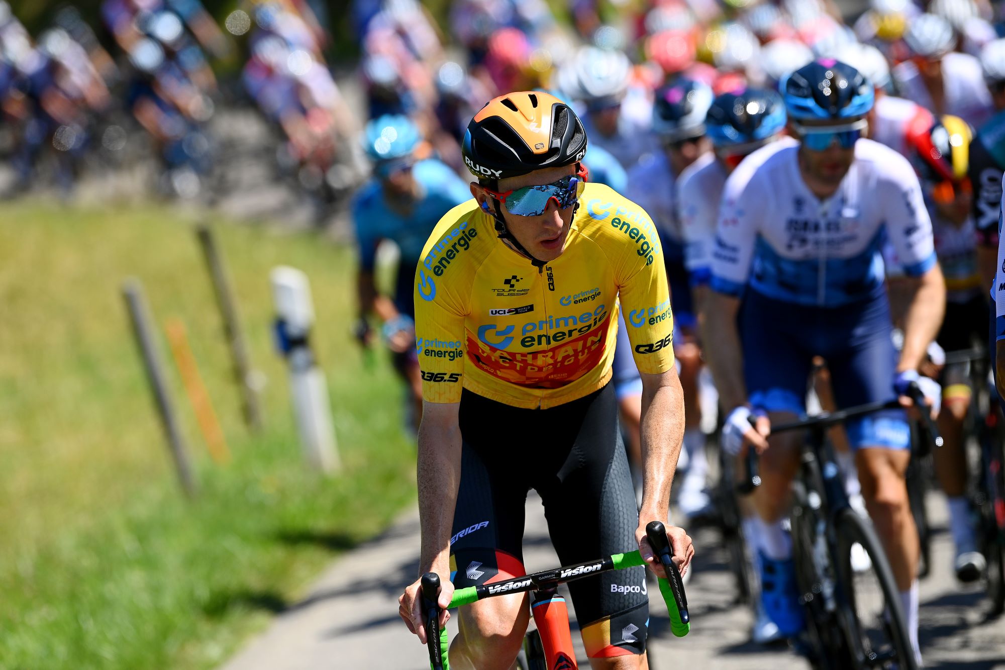 Stephen Williams wearing leaders jersey at Tour de Suisse 2022