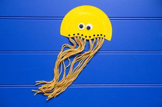 Add googly eyes to the jellyfish crafts