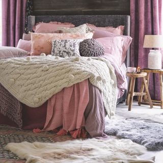 Cosy bedroom with throws on the bed
