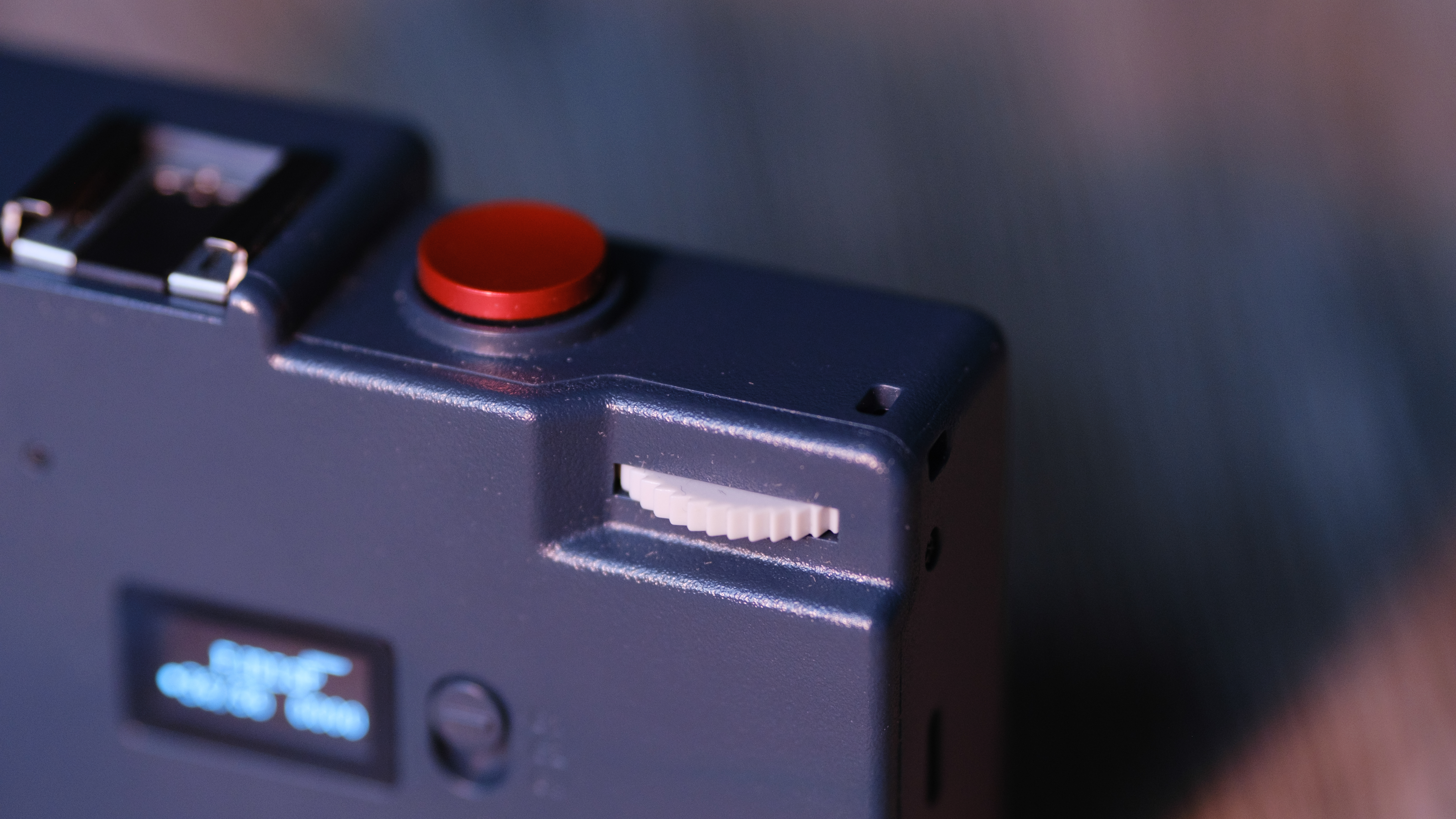 The Rewindpix on a wood background