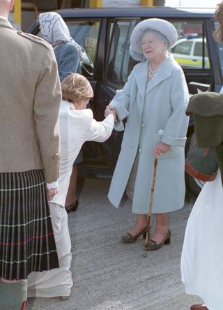 Sophie Rhys Jones curtsying to the Queen Mother