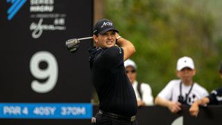 Patrick Reed takes a tee shot at the International Series Macau