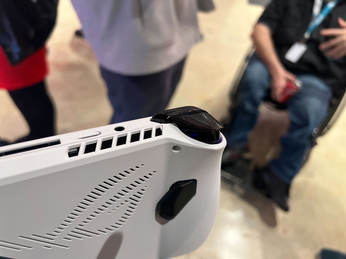white handheld with honeycomb chassis