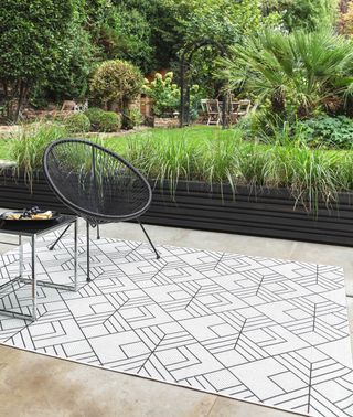 monochrome outdoor rug on a patio