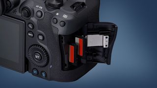 The card door of the Canon EOS R6 Mark II camera on a blue background