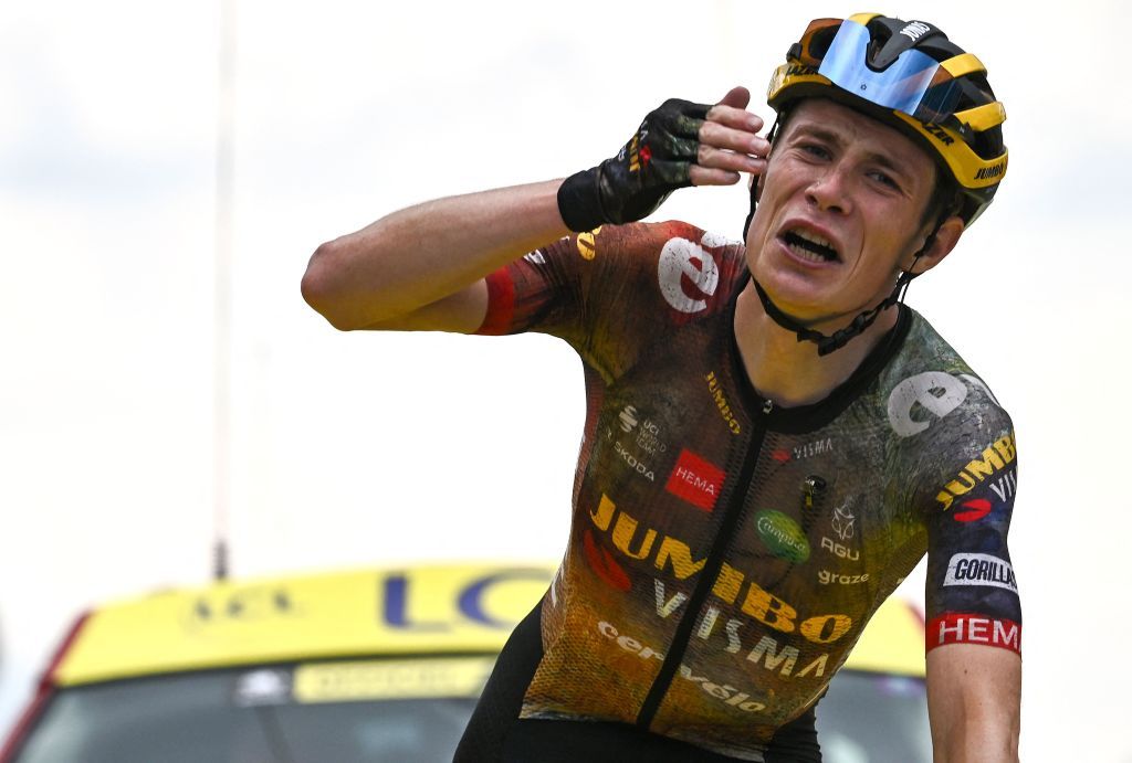 JumboVisma teams Danish rider Jonas Vingegaard celebrates as he cycles to the finish line to win the 11th stage of the 109th edition of the Tour de France cycling race 1517 km between Albertville and Col du Granon Serre Chevalier in the French Alps on July 13 2022 Photo by AnneChristine POUJOULAT AFP Photo by ANNECHRISTINE POUJOULATAFP via Getty Images