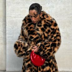 woman in leopard print jacket
