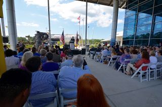 Mississippi Governor Phil Bryant welcomes the Saturn V first stage to the Infinity Science Center during a ceremony held on Tuesday morning, June 21, 2016.