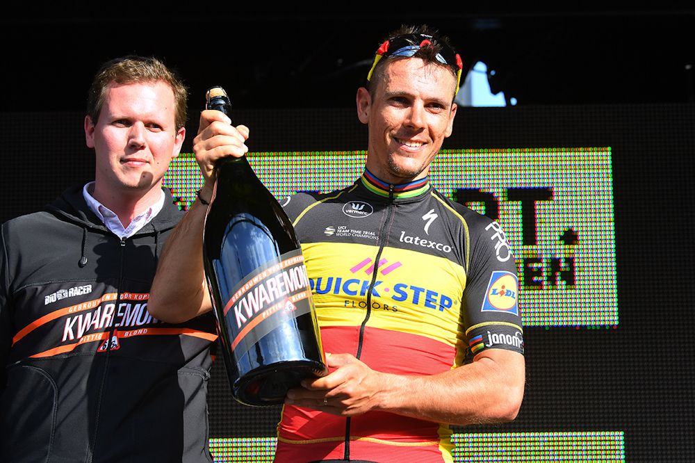 Philippe Gilbert on the podium after winning stage 1 at Three Days of De Panne
