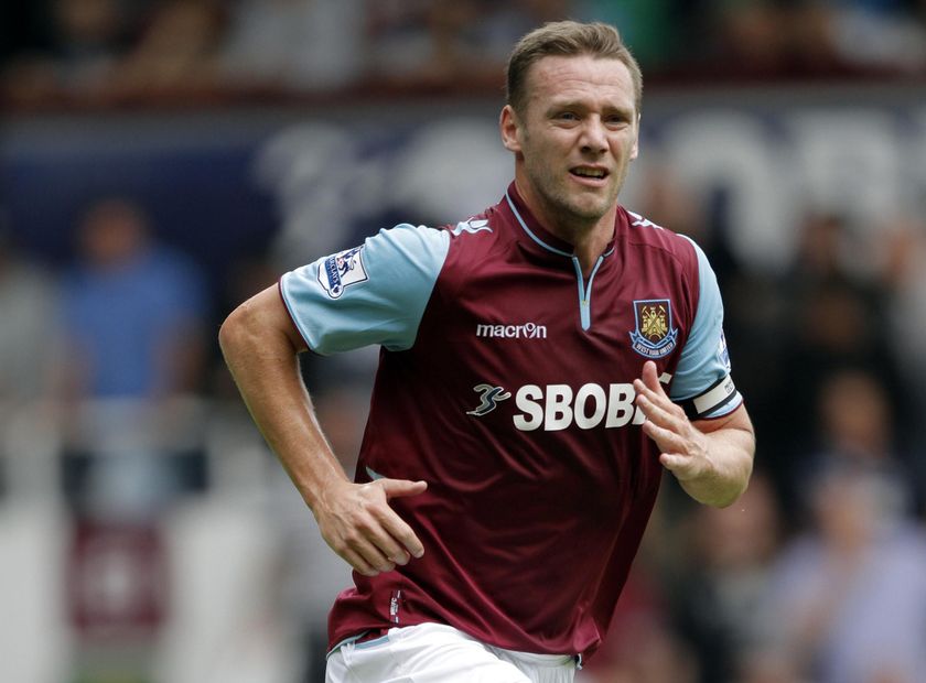 Kevin Nolan runs while playing for West Ham against Fulham, 2012