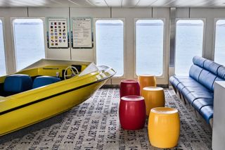 Yellow boat and colourful stools in play area on MV Queenscliff Ferry